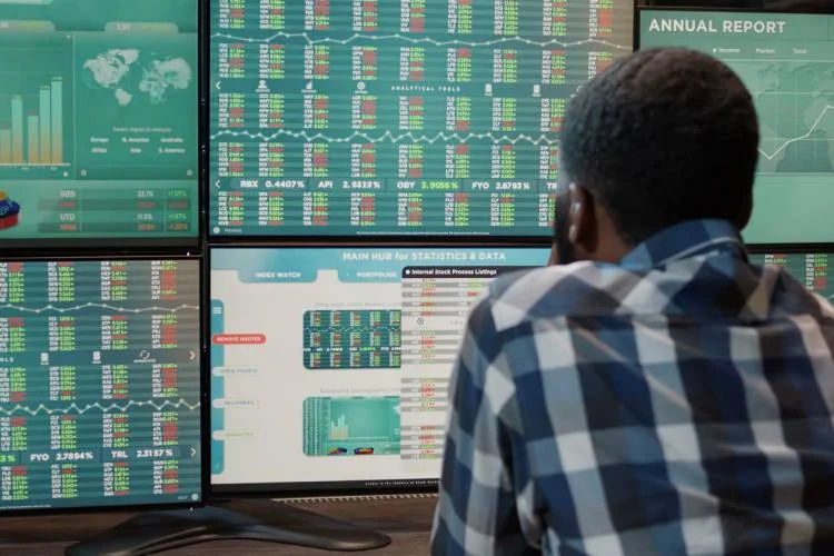 african-american-man-working-with-forex-market-exchange-multi-monitors-workstation-analyzing-stock-funds-capital-banking-sales-buy-sell-profit-money-financial-growth